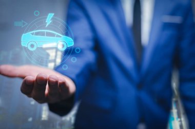 Choosing an electric vehicle. electric car choice. pointing at symbol on charging machine. electric car production Virtual Technology AR Augmented Reality or VR Virtual Reality metaverse