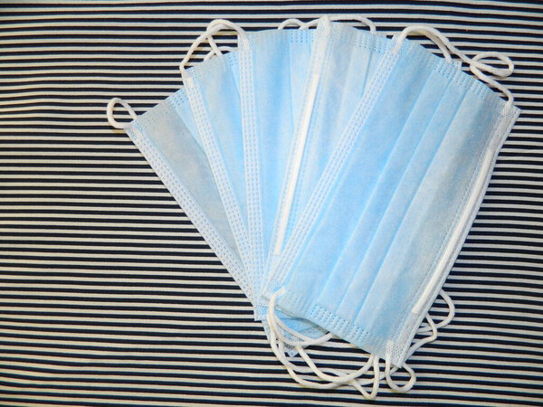 protective masks on black and white striped background pandemic covid 19 security