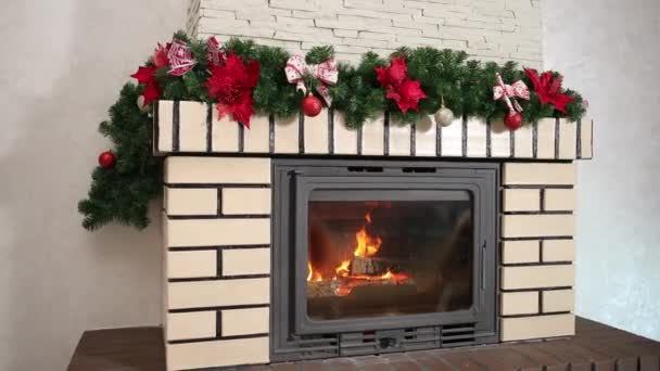 Christmas and happy new year eve decorations, cosy fire place. Winter holidays — Stock Video