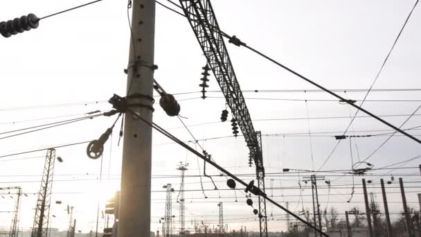 Electric wires on the railway. Transmission lines. View below. railway electric — Stock Video