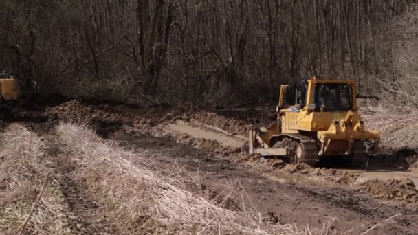 Bulldozer Cantiere Spala Terreno Mucchio Attrezzature Costruzione Escavatore Giallo Pesante — Video Stock