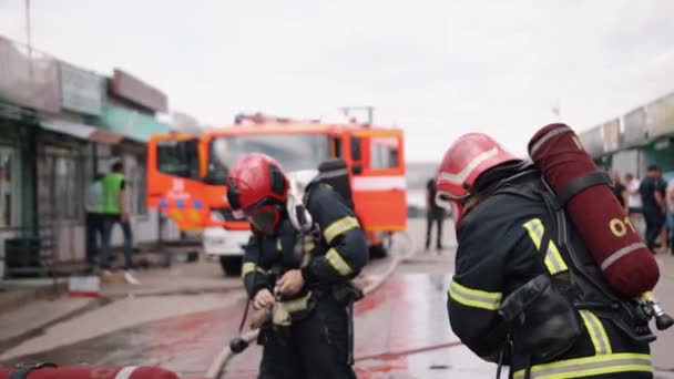 Group Firefighters Preparing Emergency Firefighter Protective Uniform Inspecting Equipment His — ストック動画