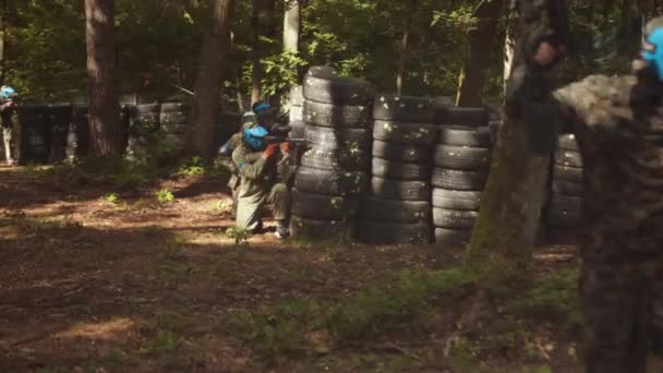Participating Leisure Activities Engaging Outdoor Paintball Games Friends Wearing Camouflage — Stock video