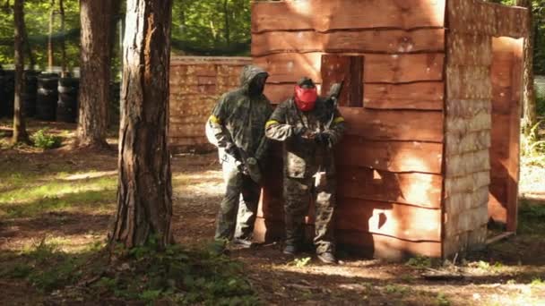 Paintball Battle Game Being Played Friends Wearing Camouflage Protective Masks — Stock video