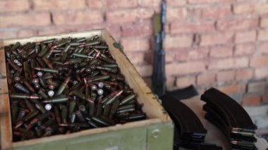 AK47 ammunition, military ammunition, cartridges, and ammunition stores in a large army box