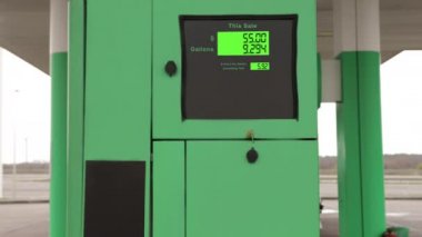 Closeup of a fuel pump counter price, increase petrol prices, digital counter counting up dollars of a gas pump, and rising prices at a gas station.
