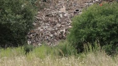 Waste lying thickly up, big garbage mountain, garbage dump piles or landfills, garbage dump area from food