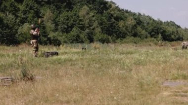 An Ukrainian serviceman prepares the Precision Shoulder-Fired Rocket Launcher, PSRL-1, as he prepares to fire it.