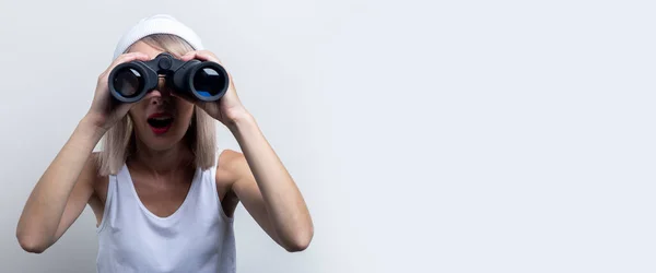 Surprised Young Woman Looking Binoculars Light Background Banner — Stock Photo, Image