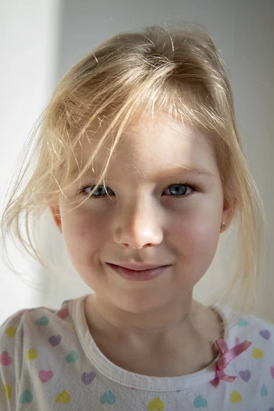 Smiling Beautiful Child Girl Blonde Natural Light Background White Wall — 스톡 사진