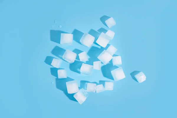 Many Ice Cubes Blue Background Top View Flat Lay — Stock Fotó