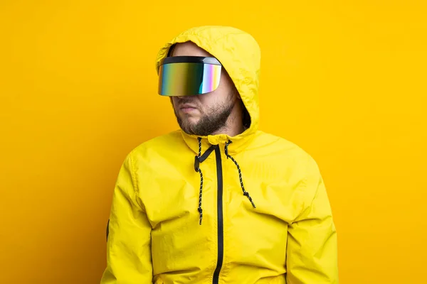 Young Man Cyberpunk Glasses Yellow Jacket Looking Away Yellow Background — Foto de Stock