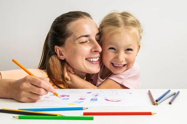 Joyful Mother Daughter Drawing Together Colored Pencils Paper — 스톡 사진