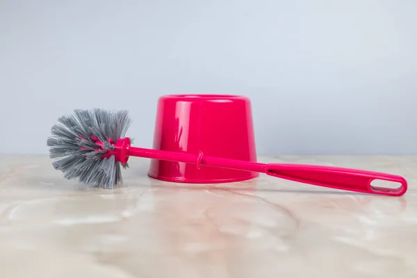 toilet brush for cleaning and cleaning the toilet bowl pink
