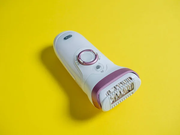 Female Electric Epilator Yellow Background Concept Beauty Personal Care Devices — Stock Photo, Image