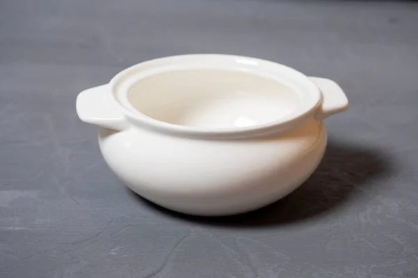 Close Empty Tureen Made White Porcelain Standing Textured Gray Background — Stock Photo, Image