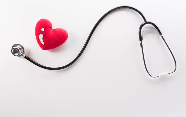 World blood donor day, red cross and nurse day concept made from red heart and stethoscope on white background.