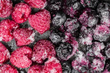 Dondurulmuş meyve. Donmuş dutların arka planı.