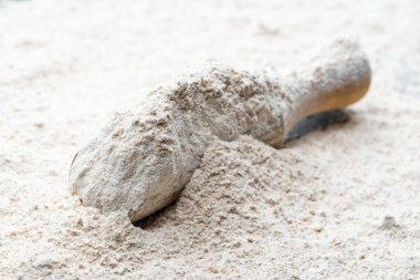 Ahşap kepçeli un ile arka plan