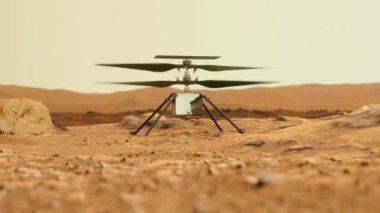 Helikopter Ustalığı Mars 'ı keşfediyor. Mars yüzeyindeki insansız hava aracı kayaları inceliyor.