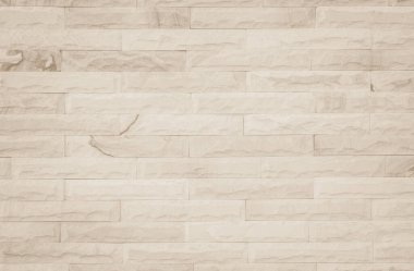 Geniş krem tuğla duvar dokusunun arka planı. Eski kahverengi tuğlalı beton duvar desenli duvar, duvar kağıdı kireç taşı soyut döşeme / Sistem düzensiz iç kaya. Ev ya da ofis tasarımı arka planı. Yatay mimari duvar kağıdı. Eski tuğla duvar boş