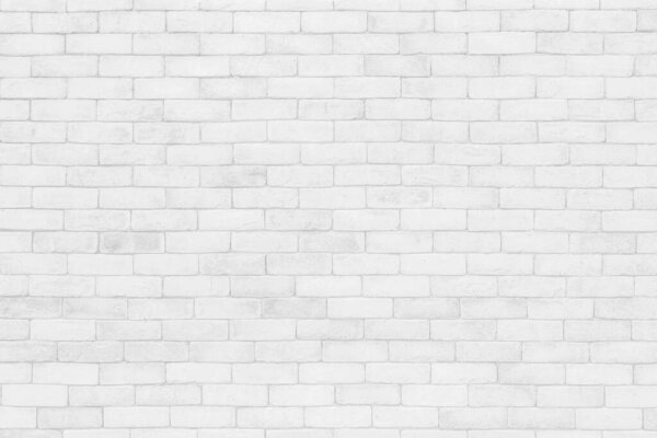 Empty white brick wall. White brick wall texture background in room at subway. Brickwork stonework interior, Clean concrete uneven abstract weathered bricks tile design, Horizontal architecture wallpaper. Aged paint white brick wall background