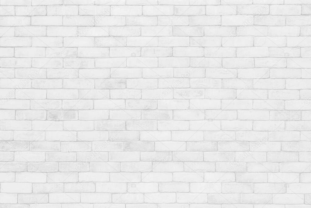 Empty white brick wall. White brick wall texture background in room at subway. Brickwork stonework interior, Clean concrete uneven abstract weathered bricks tile design, Horizontal architecture wallpaper. Aged paint white brick wall background