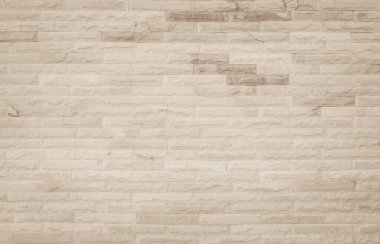 Krema ve bej rengi eski tuğla duvar dokusu veya tuğla duvar arka planı. İç dekorasyon ve endüstriyel yapı tasarımı için klasik tuğla duvar. Doğal yapı, tuğla yüzey dokusu arkaplanı oluşturan tuğla duvar motifleri.