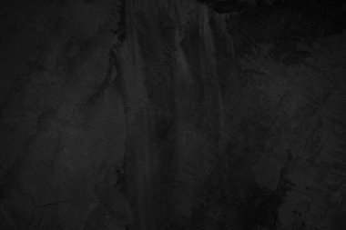 Siyah arka plan için sanat simsiyah beton dokusu. Renkli, karalanmış yüzey duvarı kaplaması soyut renkli kağıt çizikleri eski, eski, eskimiş çimento ve kum rengi koyu renk detay örtüsü var. Beton dokusu. Siyah beton parçası.