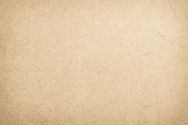 Arka plan olarak Kahverengi geri dönüştürülmüş zanaat kağıt dokusu. Krem kağıt doku, Eski vintage sayfa veya grunge vinyet. Desen kaba sanat grunge mektup buruşturulmuş. Metin için kopyalama alanı olan hardboard.
