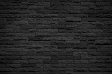 Soyut koyu tuğla duvar dokusu arka plan deseni, duvar tuğlası yüzey dokusu. Siyah renge boyanmış tuğla, eski temiz beton şebeke düzensiz, ev ya da ofis tasarımı arkaplan dekorasyonu.