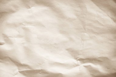 Eski kağıt. Buruşmuş kağıt dokusu. Kahverengi geri dönüşümlü Kraft kağıdı buruşmuş eski doku arkaplanı harf olarak kullanılıyor. Yıllanmış kağıt. Soyut parşömen eski retro sayfa grunge boş gazete. Krem deseni pürüzlü grunge yüzey arkaplanı kopyalama alanı ile.