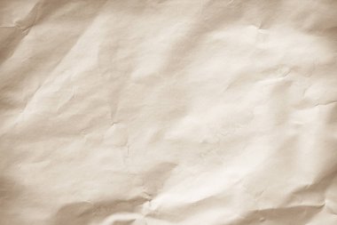 Eski kağıt. Buruşmuş kağıt dokusu. Kahverengi geri dönüşümlü Kraft kağıdı buruşmuş eski doku arkaplanı harf olarak kullanılıyor. Yıllanmış kağıt. Soyut parşömen eski retro sayfa grunge boş gazete. Krem deseni pürüzlü grunge yüzey arkaplanı kopyalama alanı ile.