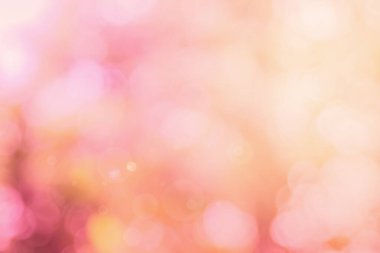 Soyut bulanık turuncu renk ve arkaplan şeftalisi, Görüntü festivali ışıkları açık hava ve pembe baloncuk odaklı desen dekorasyonu.