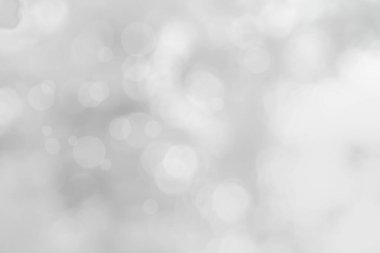 Arkaplan için soyut bulanık gri renk, Görüntü festivali ışıkları açık hava kutlaması ve kazanan için zarif beyaz bokeh odaklı dekoratif tasarım.