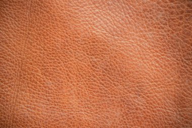 Hakiki deri dokusu arka planı. Koyu kahverengi, turuncu desenler dekorasyon için boş. Tasarım çizgisi desenli klasik cilt doğal süet veya kırmızı soyut duvar kağıdı veya arka plan lüks etkinliği kullanılabilir.