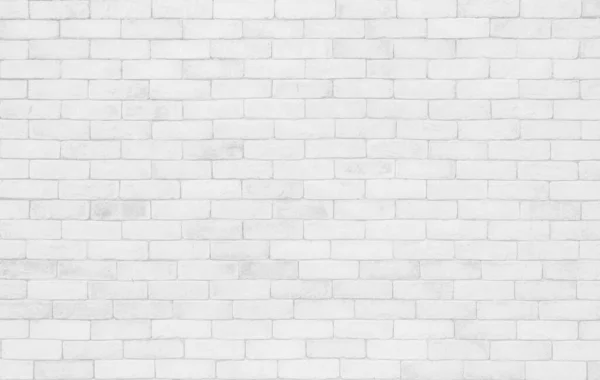 White grunge brick wall texture background for stone tile block painted in grey light color wallpaper modern interior and exterior and room backdrop design. Simple seamless pattern grid for backdrop.
