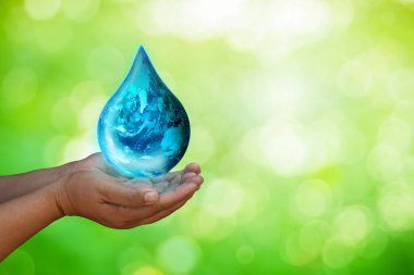 Dünya 'nın yakıt düşüşü insanların elindeydi. Dünya Çevre Günü ve Yeşil Dünya. Enerji tasarrufu çevre koruma kavramı ve metin için alan. Bu görüntünün elementleri NASA tarafından desteklenmektedir.