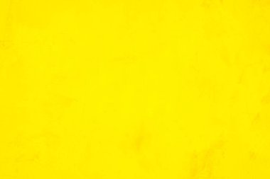 Doku arka planı için beton duvar sarısı rengi. Soyut grunge büyüyen efektli parlak renkli arkaplan. Pastel sarısı, düşük kontrastlı, pürüzlü ve düzensiz..