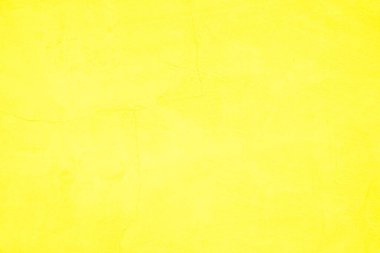 Doku arka planı için beton duvar sarısı rengi. Soyut grunge büyüyen efektli parlak renkli arkaplan. Pastel sarısı, düşük kontrastlı, pürüzlü ve düzensiz..