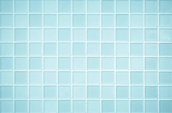 Blue ceramic wall and floor tile abstract background. Design geometric gray mosaic texture decoration of the bedroom. Simple seamless pattern grid for backdrop hospital wall, canteen and kitchen.