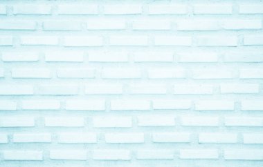 Soluk mavi boyalı tuğla duvar. Pastel, sakin, ton, arka plan. Tuğla ve taş işçiliği döşeme döşeme eski kaya deseni temiz beton ızgara düz olmayan tuğla dizayn arkaplan.