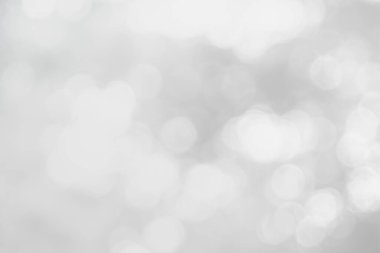 Arkaplan için soyut bulanık gri renk, Görüntü festivali ışıkları açık hava kutlaması ve kazanan için zarif beyaz bokeh odaklı dekoratif tasarım.