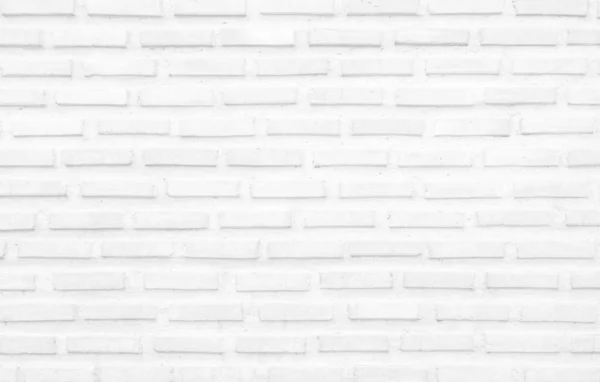 White grunge brick wall texture background for stone tile block painted in grey light color wallpaper modern interior and exterior and room backdrop design. Simple seamless pattern grid for backdrop.