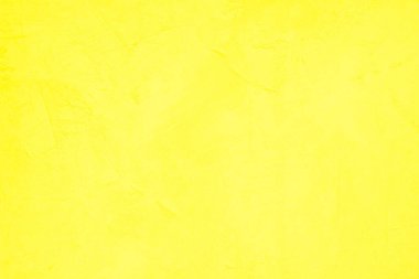 Doku arka planı için beton duvar sarısı rengi. Soyut grunge büyüyen efektli parlak renkli arkaplan. Pastel sarısı, düşük kontrastlı, pürüzlü ve düzensiz..