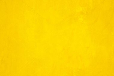 Doku arka planı için beton duvar sarısı rengi. Soyut grunge büyüyen efektli parlak renkli arkaplan. Pastel sarısı, düşük kontrastlı, pürüzlü ve düzensiz..