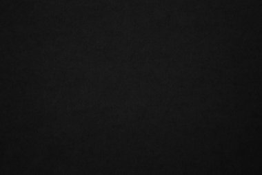 Black paper texture background. Black blank cardboard sheet page. Old vintage page dark grunge vignette. Pattern rough art rustic grunge letter. Material cardboard with copy space for luxury text.