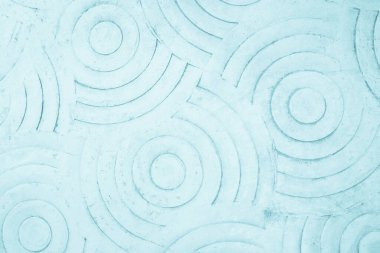 Pastel mavisi beton desen yaz duvar kâğıdında arka plan için kıvrılmış. Çimento ve tonlamalardan oluşan kum duvar. Soyut beton kaplama zemin bahçe yolunda cilalanmış..