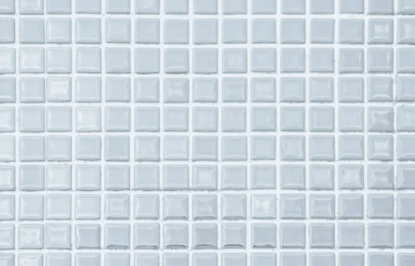 White tile wall chequered background bathroom floor texture. Ceramic wall and floor tiles mosaic background in bathroom and kitchen clean. Design pattern geometric with grid wallpaper decoration pool. Seamless pattern for backdrop advertising banner.