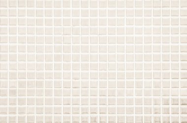 Cream light ceramic wall and floor tiles mosaic background in bathroom and kitchen. Design pattern geometric with grid wallpaper texture decoration pool. Simple seamless abstract surface clean.